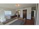 Bedroom with double bed, couch, and access to bathroom at 547 Queens Mirror Cir, Casselberry, FL 32707