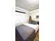 King sized bed and wood floors in bright bedroom at 547 Queens Mirror Cir, Casselberry, FL 32707
