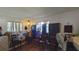 Common area with some furniture and hardwood floors at 547 Queens Mirror Cir, Casselberry, FL 32707