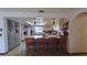Bright kitchen features a breakfast bar and ample counter space at 547 Queens Mirror Cir, Casselberry, FL 32707