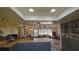 Open concept kitchen with island and gray cabinets at 547 Queens Mirror Cir, Casselberry, FL 32707