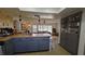 Open concept kitchen with island and gray cabinets at 547 Queens Mirror Cir, Casselberry, FL 32707