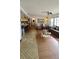 Open floor plan seamlessly connecting the kitchen and living room at 547 Queens Mirror Cir, Casselberry, FL 32707