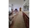 Spacious living room with hardwood floors and a cozy seating area at 547 Queens Mirror Cir, Casselberry, FL 32707