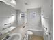 Clean bathroom with a shower/tub combo and updated vanity at 7207 Summit Pl, Winter Haven, FL 33884