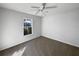 Spacious bedroom with carpet flooring and large window at 7207 Summit Pl, Winter Haven, FL 33884