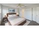 Cozy bedroom with a wooden bed frame and en-suite bathroom at 7207 Summit Pl, Winter Haven, FL 33884
