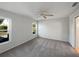 Bright bedroom with carpet flooring and ceiling fan at 7207 Summit Pl, Winter Haven, FL 33884