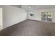 Large main bedroom with sliding door access to backyard at 7207 Summit Pl, Winter Haven, FL 33884