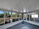 Sunroom with ample natural light and backyard access at 7207 Summit Pl, Winter Haven, FL 33884