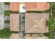 Aerial view of townhome with screened patio and roof at 8451 Leatherleaf Ln, Orlando, FL 32827