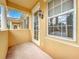 Private balcony with door access and window at 8451 Leatherleaf Ln, Orlando, FL 32827
