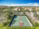 Community basketball court with ample surrounding space at 8451 Leatherleaf Ln, Orlando, FL 32827