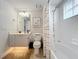 Clean bathroom with bathtub, shower, and vanity at 8451 Leatherleaf Ln, Orlando, FL 32827