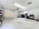 Attached garage with ample space for storage and parking at 8451 Leatherleaf Ln, Orlando, FL 32827