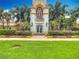 Community town center building with landscaping at 8451 Leatherleaf Ln, Orlando, FL 32827