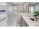 Spa-like bathroom with double vanity and walk-in shower at 9851 Walkway Dr, Orlando, FL 32832