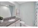 Clean bathroom with granite countertop and shower/tub combo at 9851 Walkway Dr, Orlando, FL 32832
