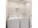 Convenient laundry room with washer and dryer included at 9851 Walkway Dr, Orlando, FL 32832