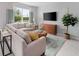 Spacious living room with large sectional sofa and neutral decor at 9851 Walkway Dr, Orlando, FL 32832
