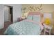Bright bedroom with built-in desk and calming decor at 9863 Walkway Dr, Orlando, FL 32832