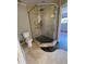 Bathroom with a walk-in shower and pebble floor at 1009 Grove St # 90, Maitland, FL 32751