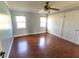Spacious bedroom with hardwood floors and ample closet space at 1009 Grove St # 90, Maitland, FL 32751