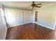 Bright bedroom with hardwood floors and double closets at 1009 Grove St # 90, Maitland, FL 32751