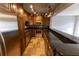 Stylish kitchen boasting stainless steel appliances and granite counters at 1009 Grove St # 90, Maitland, FL 32751