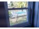 Community pool view from bedroom window at 1009 Grove St # 90, Maitland, FL 32751