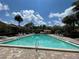 Inviting community pool with lounge chairs at 1009 Grove St # 90, Maitland, FL 32751