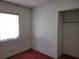Bedroom with window, closet, and carpet at 1070 N Libby Ct, Daytona Beach, FL 32117