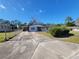 Front view of the house and driveway at 1070 N Libby Ct, Daytona Beach, FL 32117