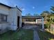 Home exterior with carport and storage shed at 1070 N Libby Ct, Daytona Beach, FL 32117