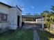 Home exterior with carport and storage shed at 1070 N Libby Ct, Daytona Beach, FL 32117
