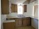 Basic kitchen with wood cabinets and built-in microwave at 1070 N Libby Ct, Daytona Beach, FL 32117