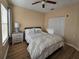 Bedroom with queen bed and double door closet at 12021 Villanova Dr # 111, Orlando, FL 32837