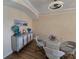Bright dining area with a round glass table and four chairs at 12021 Villanova Dr # 111, Orlando, FL 32837
