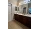 Double vanity bathroom with ample counter space at 1311 Plumgrass Cir, Ocoee, FL 34761