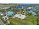 Resort-style community with pools, a volleyball court, and expansive green spaces at 13384 Leggett Aly, Orlando, FL 32827