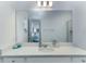 Bathroom with single vanity and walk-in shower at 13384 Leggett Aly, Orlando, FL 32827