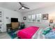 Bright bedroom with a queen bed and ceiling fan at 13384 Leggett Aly, Orlando, FL 32827