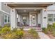 Covered porch with seating area at 13384 Leggett Aly, Orlando, FL 32827