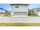Two-car garage with additional storage at 13384 Leggett Aly, Orlando, FL 32827