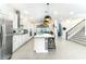 Open concept kitchen with island and stainless steel appliances at 13384 Leggett Aly, Orlando, FL 32827