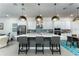 Modern kitchen with white cabinets, large island, stainless steel appliances at 13384 Leggett Aly, Orlando, FL 32827