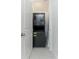 Stackable washer and dryer in a small laundry room at 13384 Leggett Aly, Orlando, FL 32827