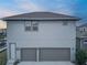 Two-car garage and back of house at 13384 Leggett Aly, Orlando, FL 32827
