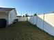 Large fenced backyard with grassy area at 1350 E Harrison St, Oviedo, FL 32765