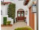 Elegant entryway with double doors and landscaping at 15687 Panther Lake Dr, Winter Garden, FL 34787